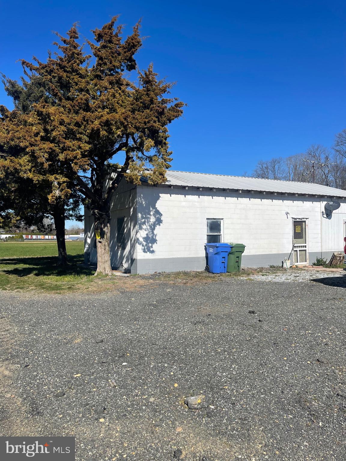 2550 Harding Highway Newfield, NJ 08344 - Photo 7 of 16 a view of a house with a tree and a yard