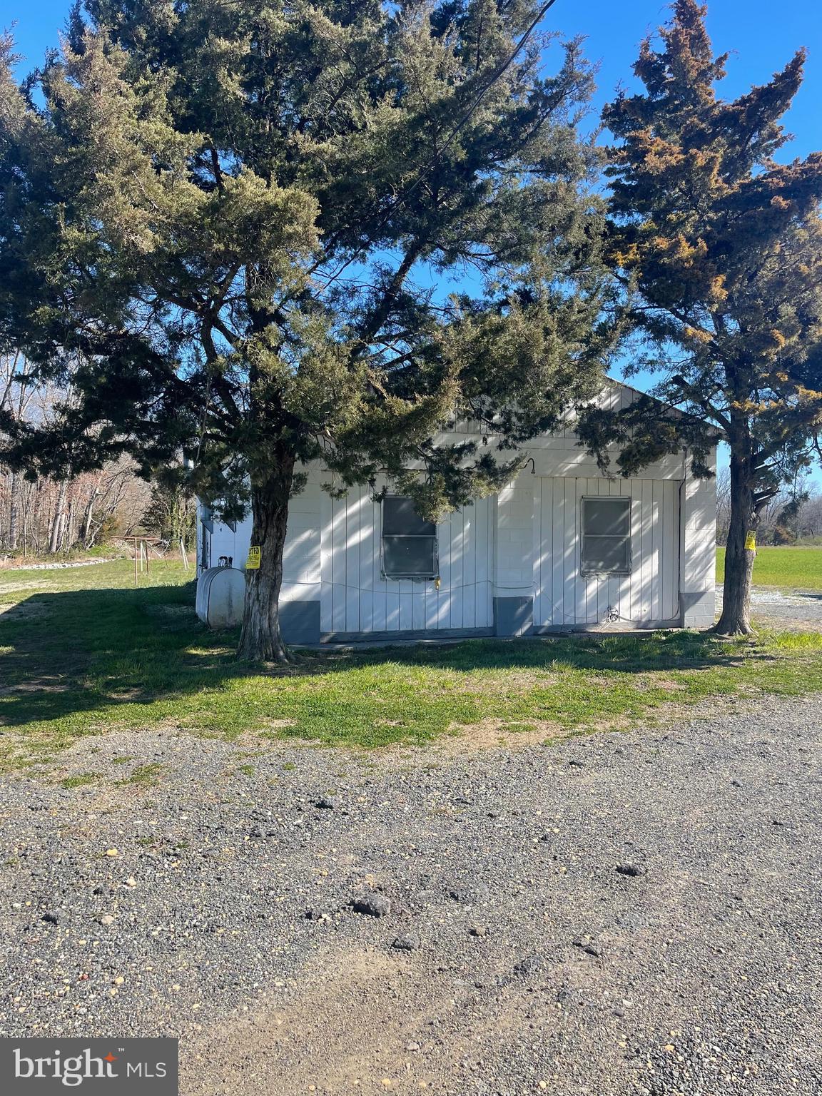 2550 Harding Highway Newfield, NJ 08344 - Photo 9 of 16 a backyard of a house with a yard and outdoor seating