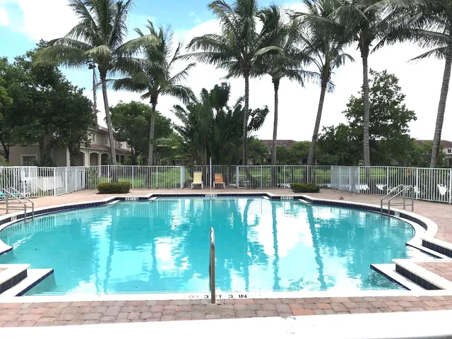 a swimming pool with a yard