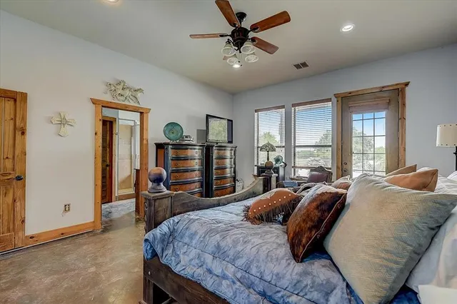 a bed room with a bed and furniture