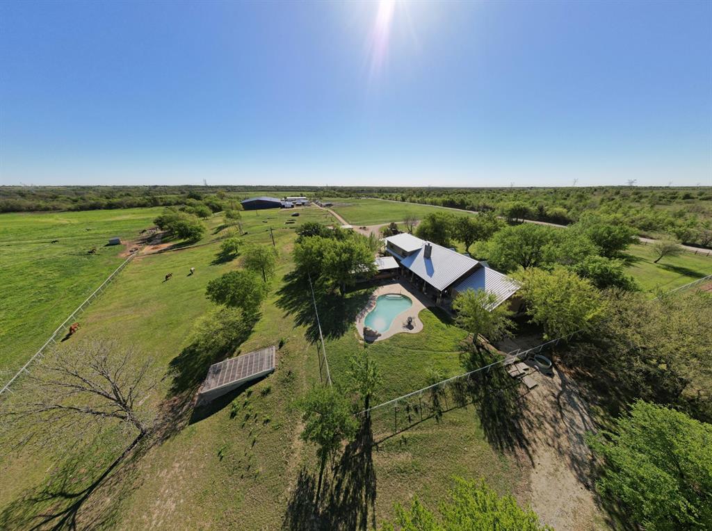 9494 Waide Road Sanger, TX 76266 - Photo 2 of 40 a view of a lake with a yard