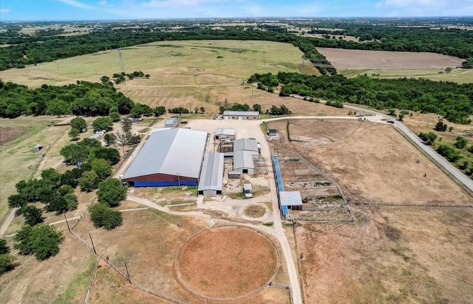 9494 Waide Road Sanger, TX 76266 - Photo 31 of 40 an aerial view of a house with a lake view