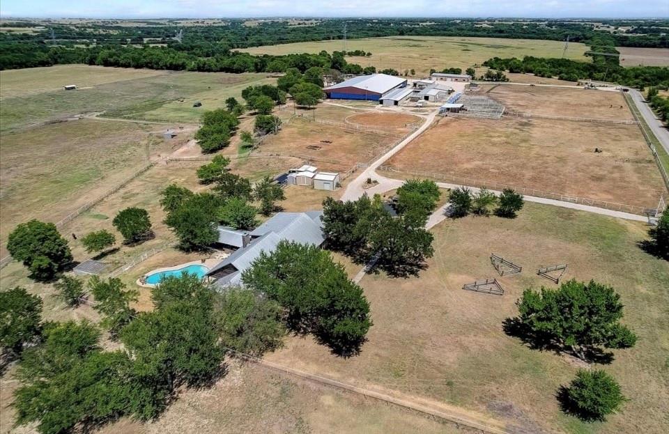 9494 Waide Road Sanger, TX 76266 - Photo 32 of 40 an aerial view of a house with a lake view
