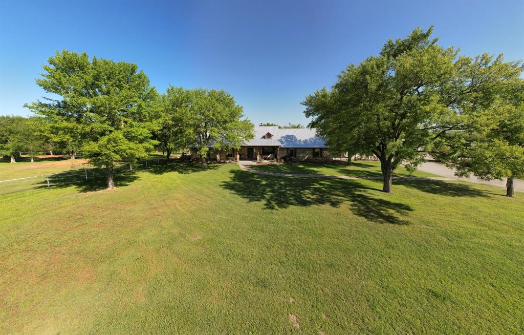 9494 Waide Road Sanger, TX 76266 - Photo 6 of 40 a view of a lake with houses