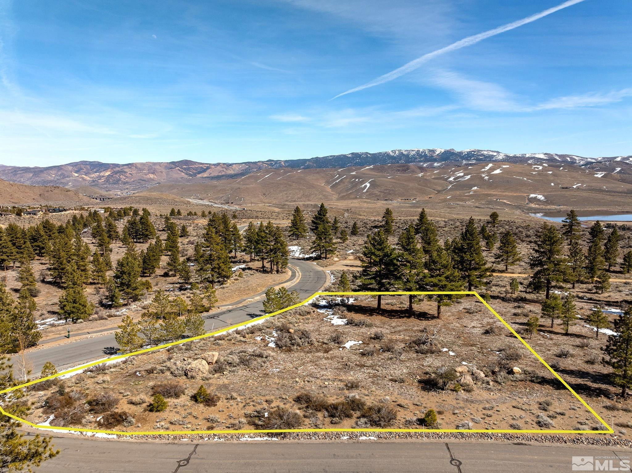 600 Sand Cherry Court Reno, NV 89511 - Photo 3 of 21 a view of a lake with a mountain