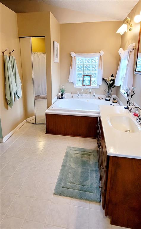 5107 McCandless Road Butler, PA 16001 - Photo 22 of 25 a spacious bathroom with sink and mirror