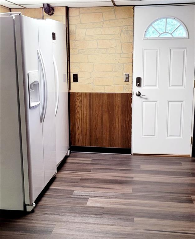 5107 McCandless Road Butler, PA 16001 - Photo 23 of 25 a view of entryway with wooden floor and stairs
