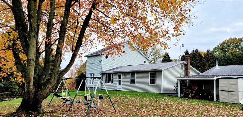 5107 McCandless Road Butler, PA 16001 - Photo 25 of 25 a front view of a house with garden