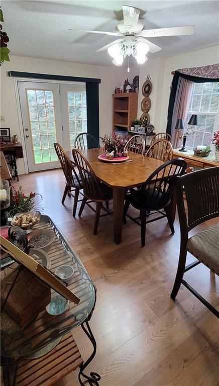 5107 McCandless Road Butler, PA 16001 - Photo 7 of 25 a view of a dining room with furniture window and wooden floor