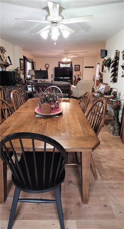 5107 McCandless Road Butler, PA 16001 - Photo 8 of 25 a view of a dining room with furniture
