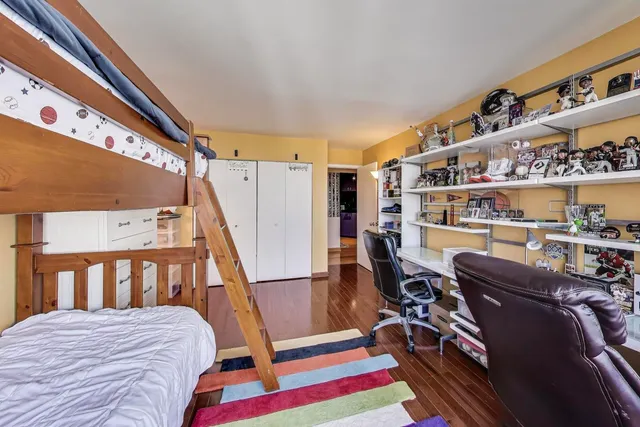a kitchen with a appliances a sink and cabinets