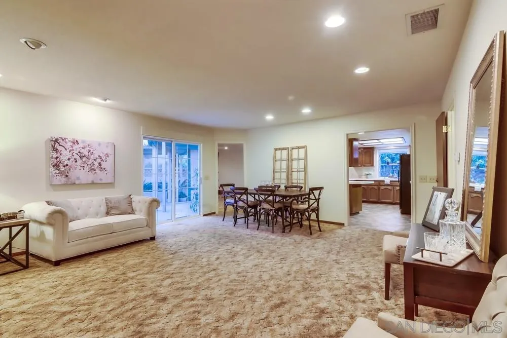 13256 Mapleview Street Lakeside, CA 92040 - Photo 14 of 58 a living room with furniture and a dining room