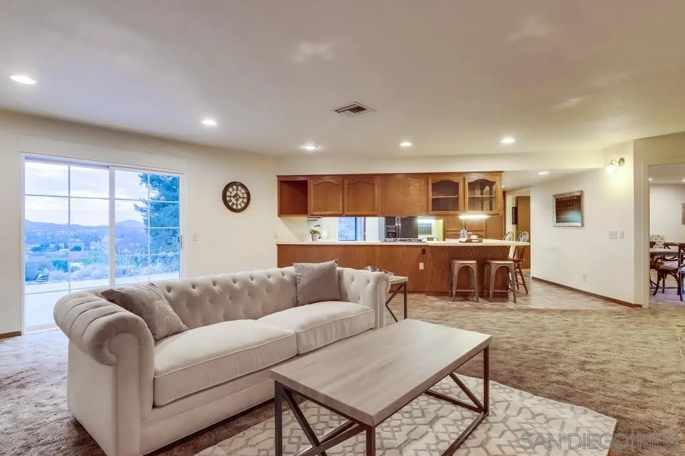 13256 Mapleview Street Lakeside, CA 92040 - Photo 20 of 58 a living room with furniture and kitchen view