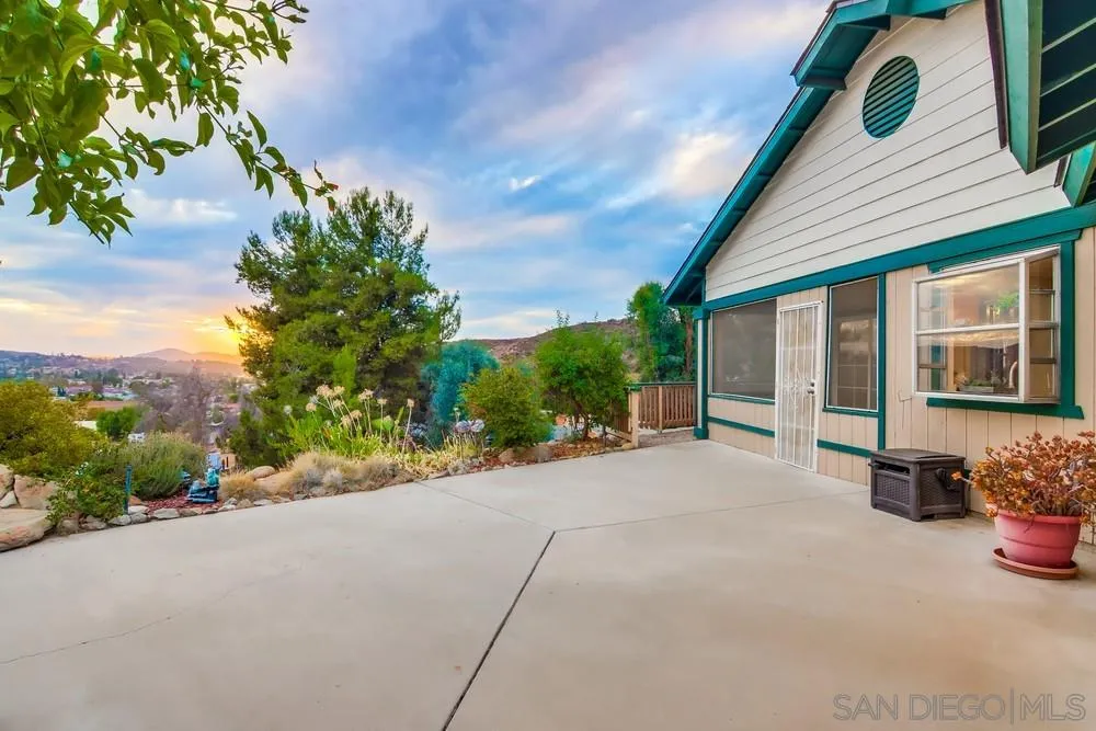 13256 Mapleview Street Lakeside, CA 92040 - Photo 49 of 58 a view of a house with a yard and potted plants