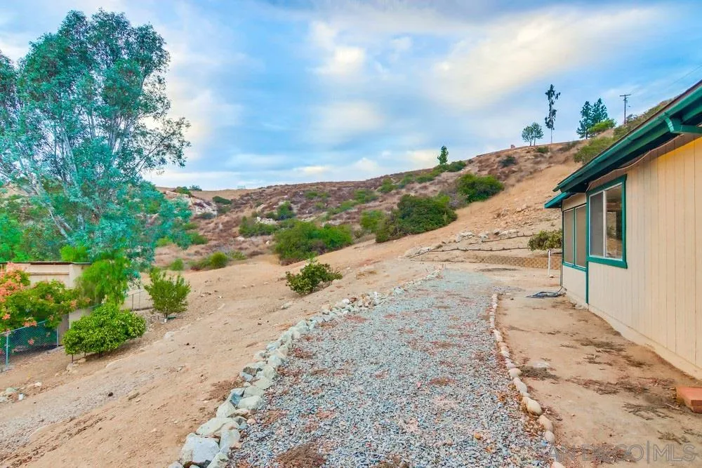 13256 Mapleview Street Lakeside, CA 92040 - Photo 54 of 58 a view of a backyard with pathway