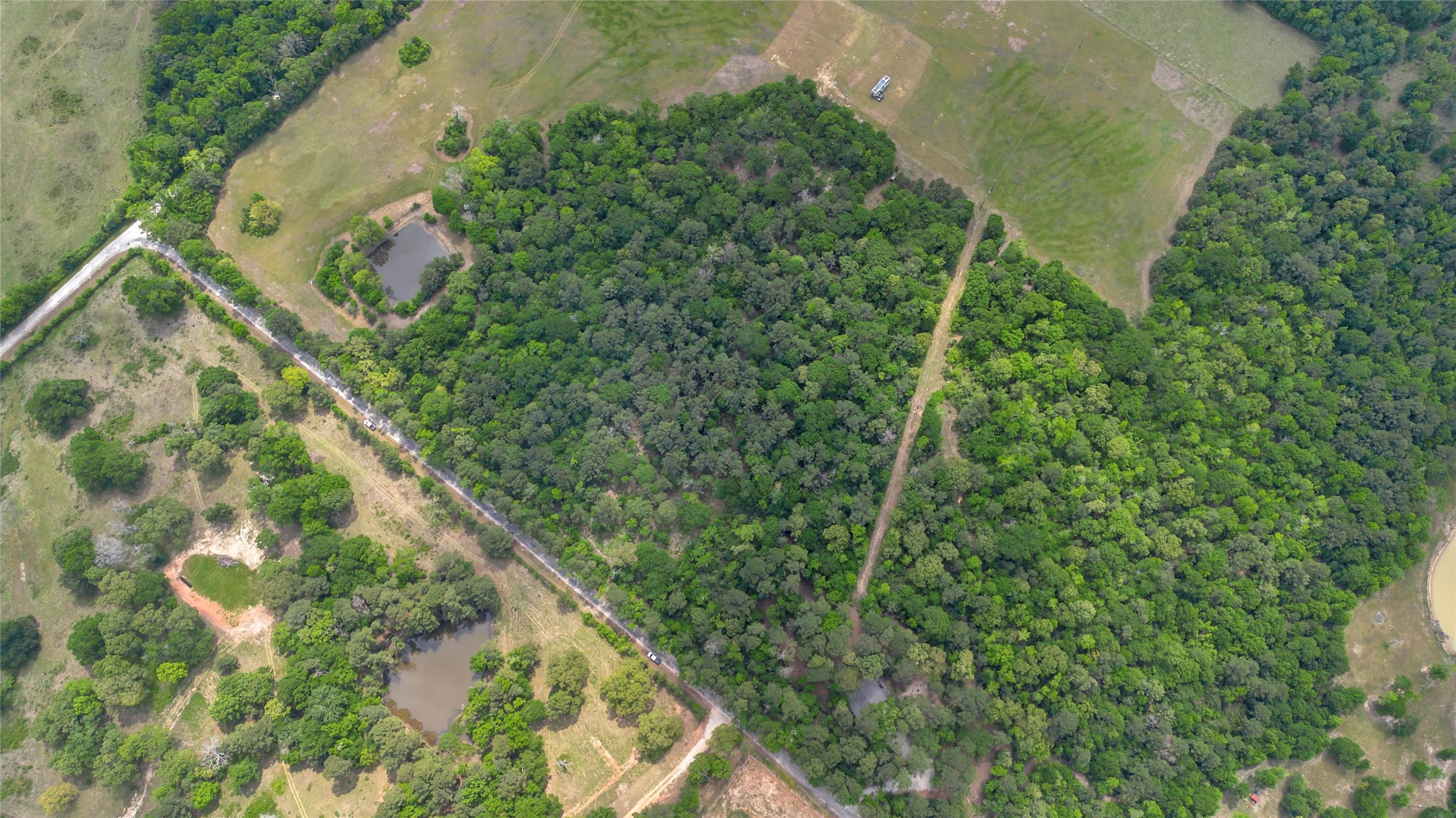 399 Pool Road Richards, TX 77873 - Photo 8 of 8 an aerial view of residential houses with outdoor space