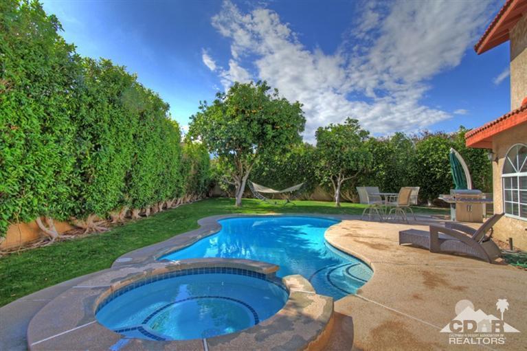 68565 Senora Road Cathedral City, CA 92234 - Photo 31 of 37 a view of a backyard with swimming pool