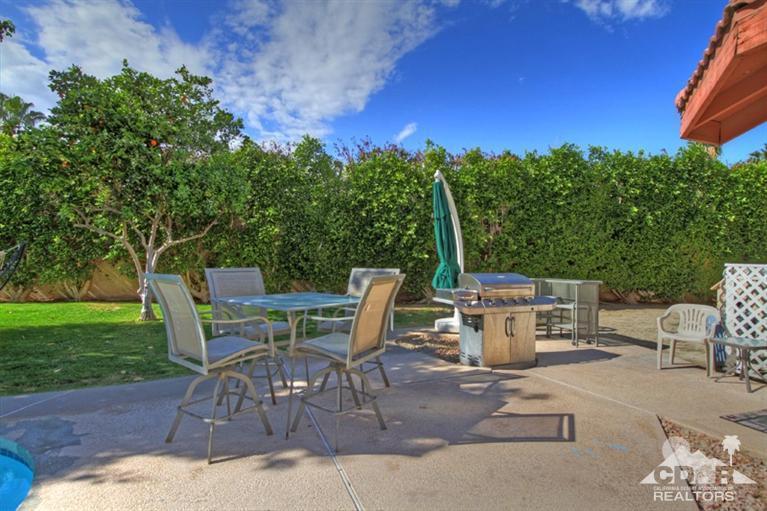 68565 Senora Road Cathedral City, CA 92234 - Photo 35 of 37 a view of backyard with seating area and green space