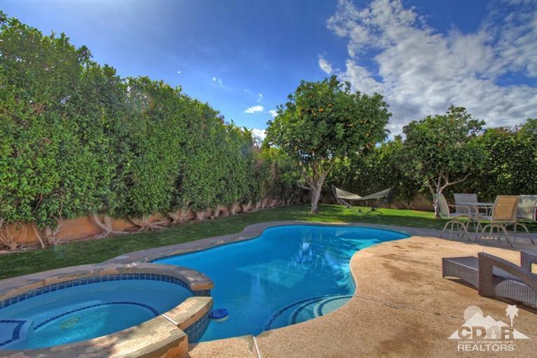 68565 Senora Road Cathedral City, CA 92234 - Photo 36 of 37 a view of a swimming pool with a yard