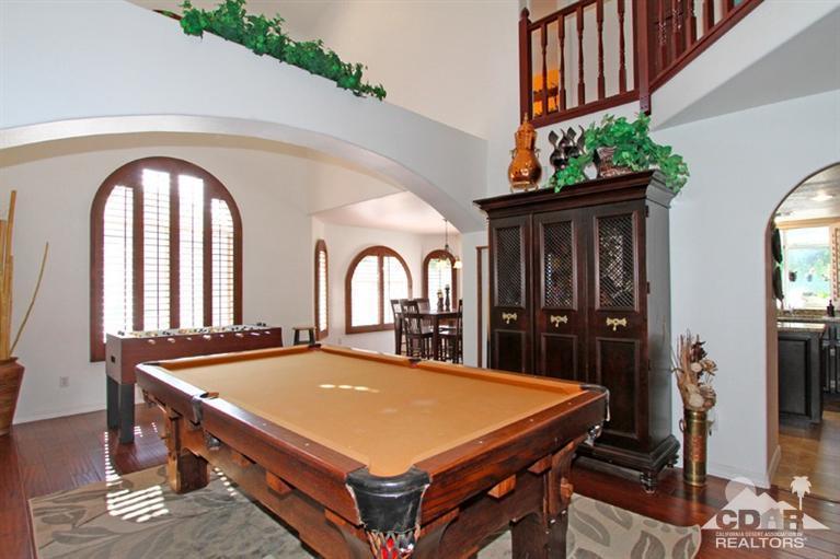 68565 Senora Road Cathedral City, CA 92234 - Photo 5 of 37 a room with pool table and windows