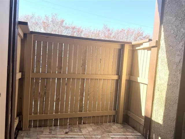 a view of a porch with a door
