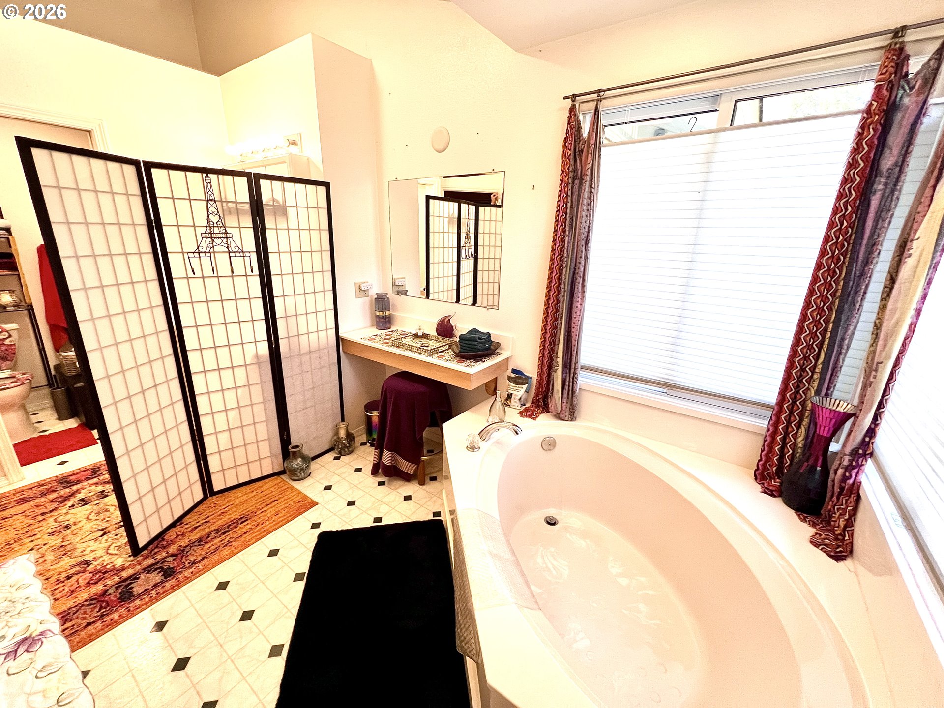 1625 Kristi Loop Lakeside, OR 97449 - Photo 21 of 41 a bathroom with a sink and a bathtub
