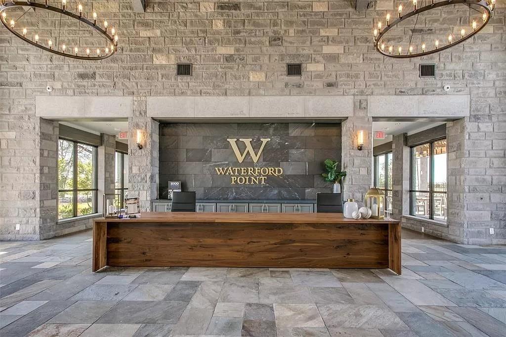 8116 Tramore The Colony, TX 75056 - Photo 25 of 36 Welcome area with a chandelier and brick wall