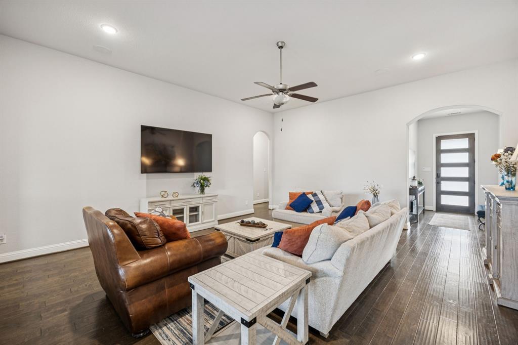 8116 Tramore The Colony, TX 75056 - Photo 5 of 36 a living room with furniture and a flat screen tv