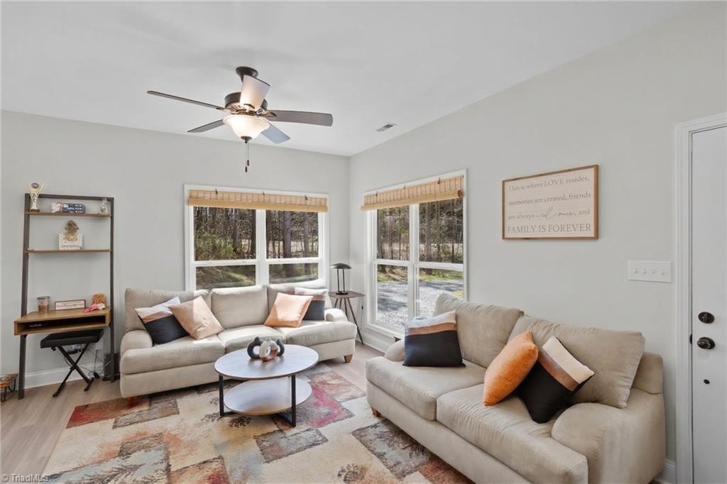 418 Davie Academy Road Mocksville, NC 27028 - Photo 11 of 39 Living room has lots of natural light