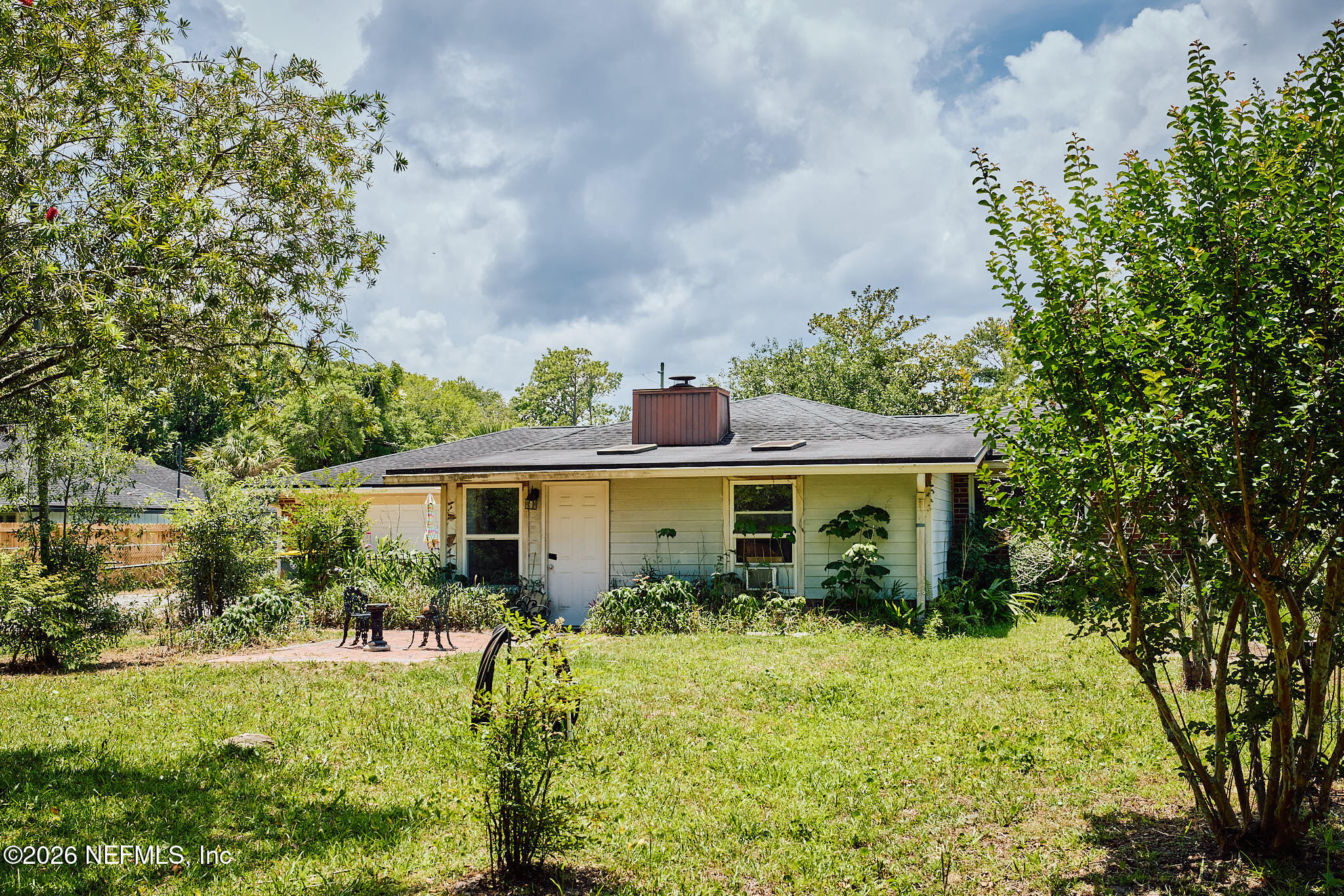 8965 San Rae Road Jacksonville, FL 32257 - Photo 35 of 46 a front view of house with yard and green space