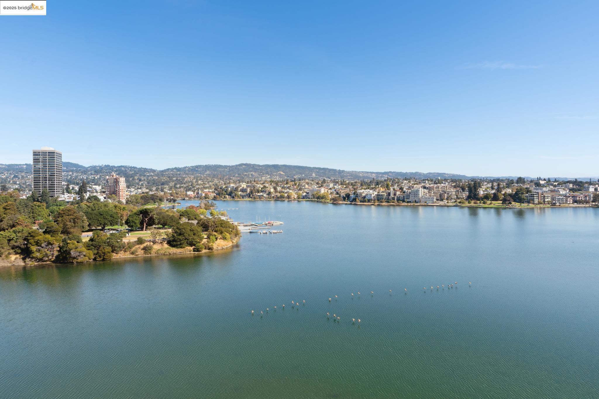 1 Lakeside Drive, Unit 1010 Oakland, CA 94612 - Photo 18 of 47 Water view featuring a mountainous background