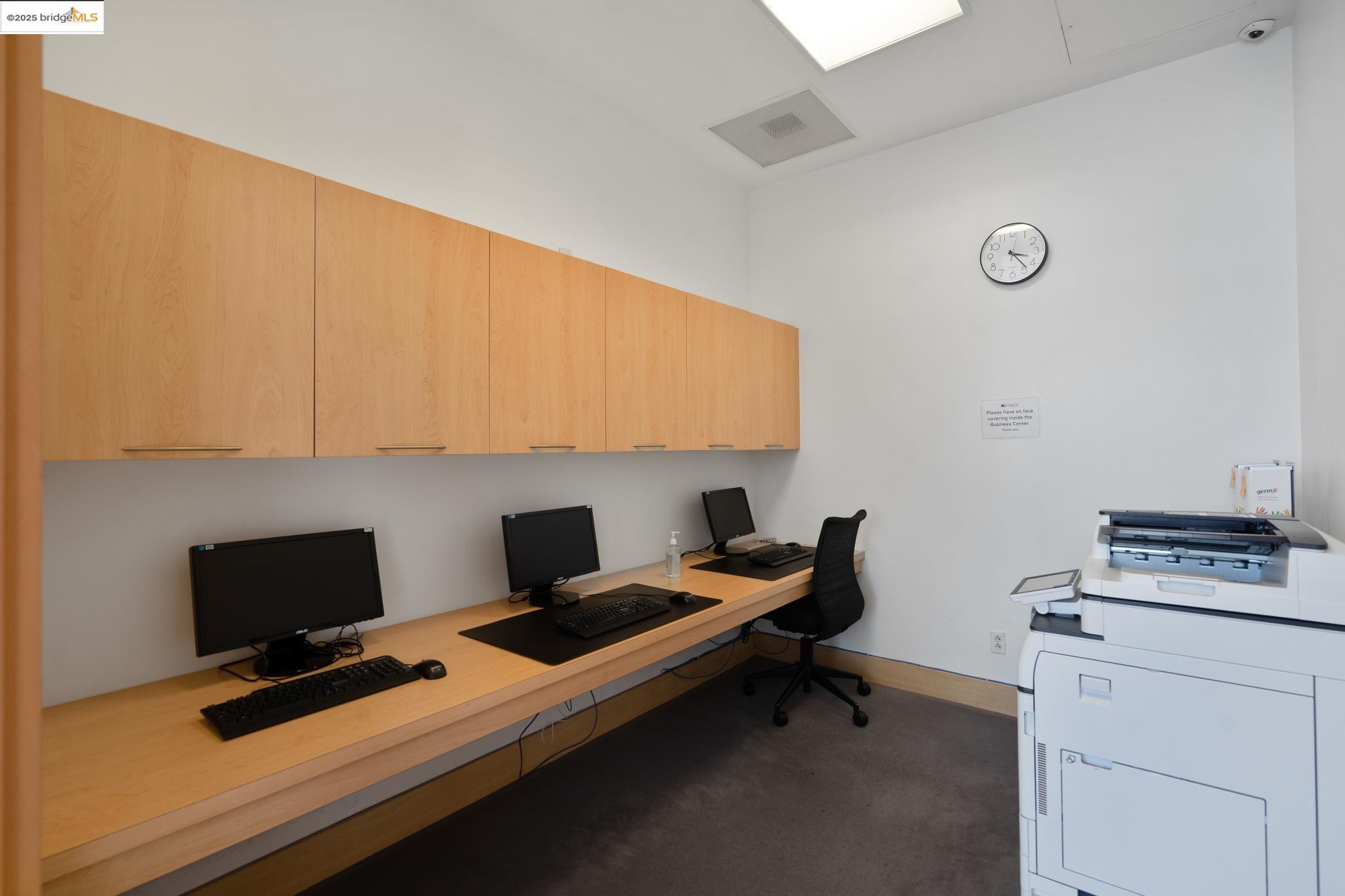 1 Lakeside Drive, Unit 1010 Oakland, CA 94612 - Photo 40 of 47 Office area featuring built in desk and dark carpet