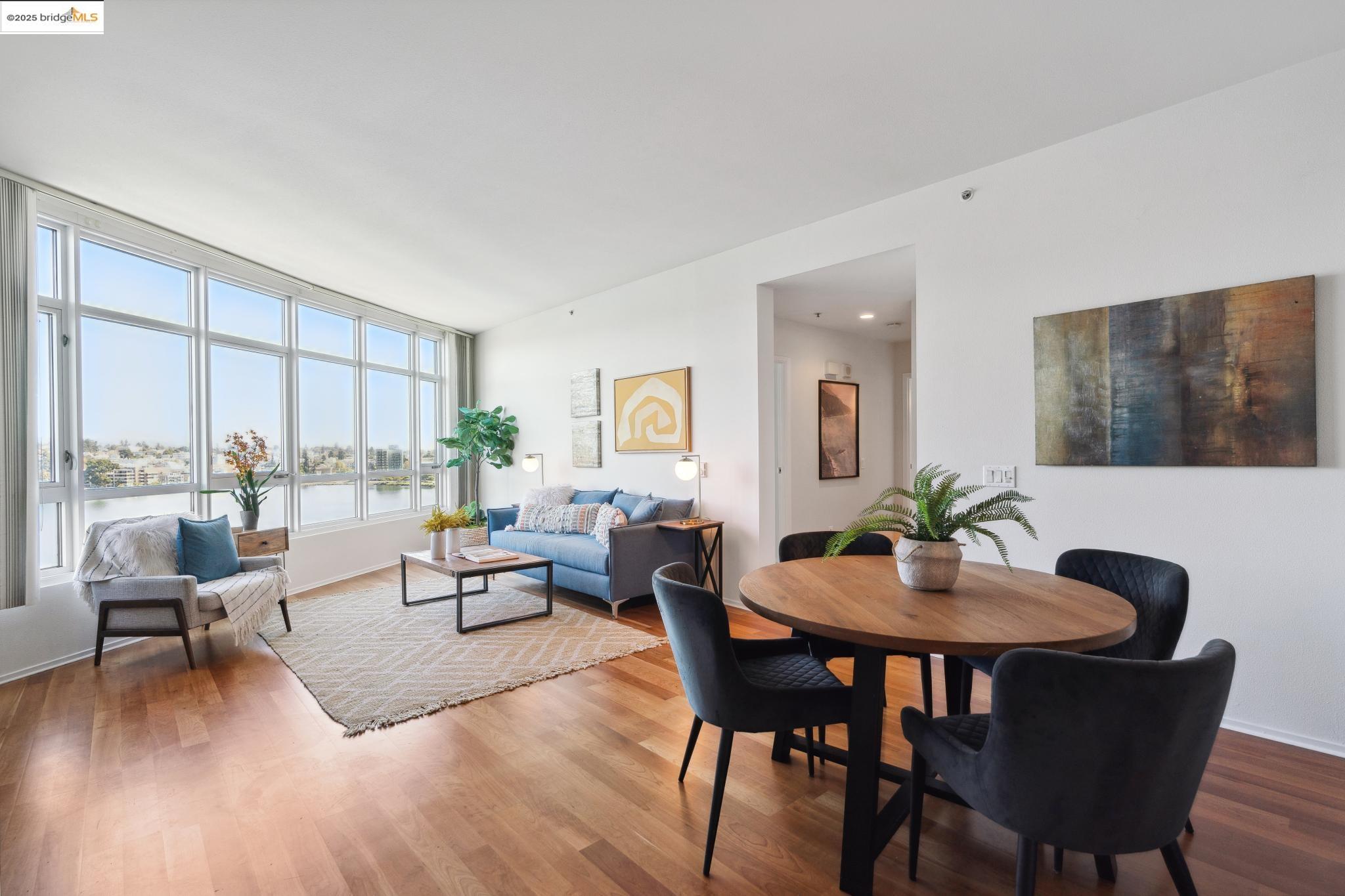 1 Lakeside Drive, Unit 1010 Oakland, CA 94612 - Photo 8 of 47 Dining room with wood finished floors and a water view