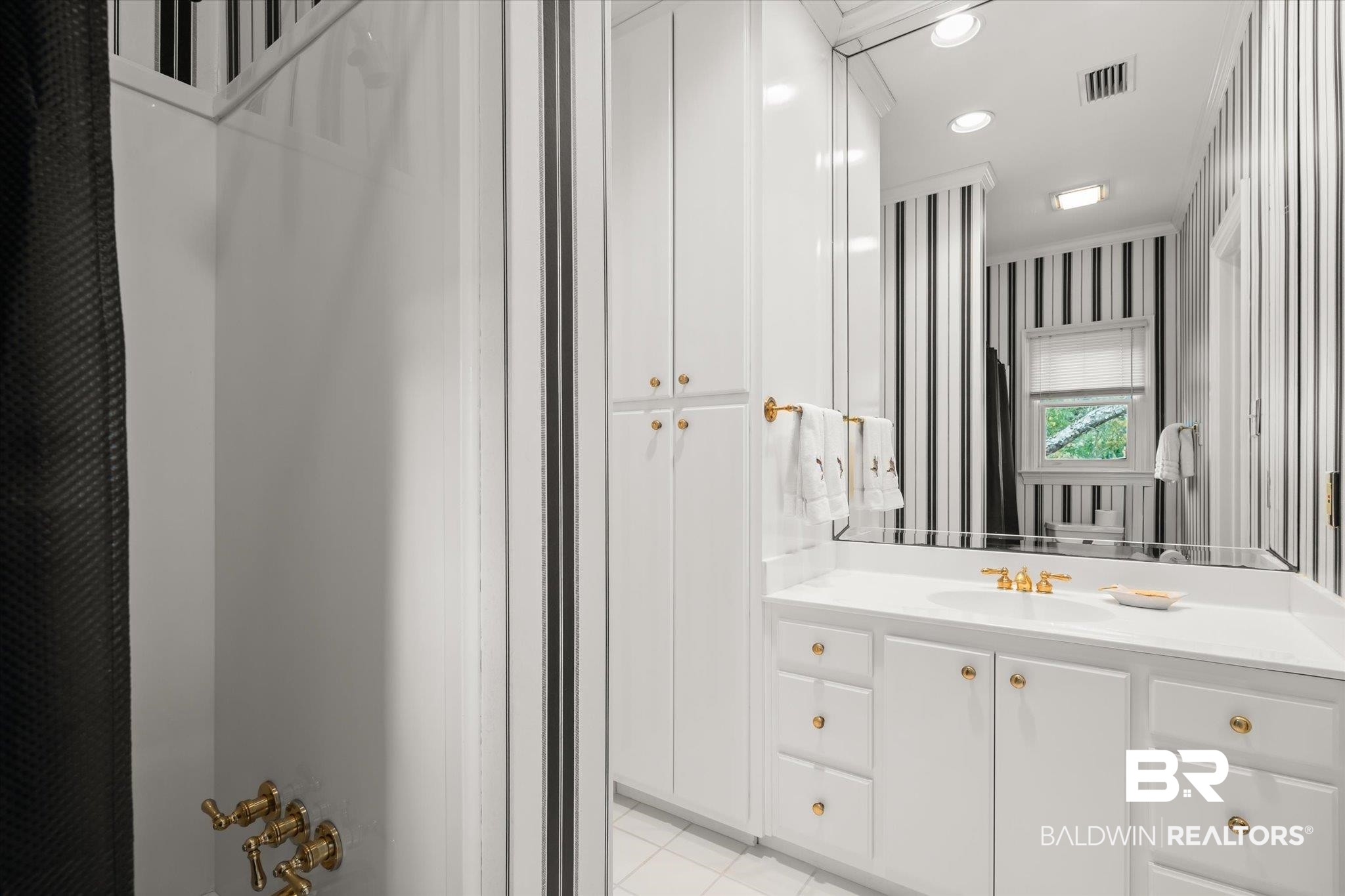 354 Dogwood Lane Mobile, AL 36608 - Photo 26 of 44 Bathroom with vanity and tile patterned flooring