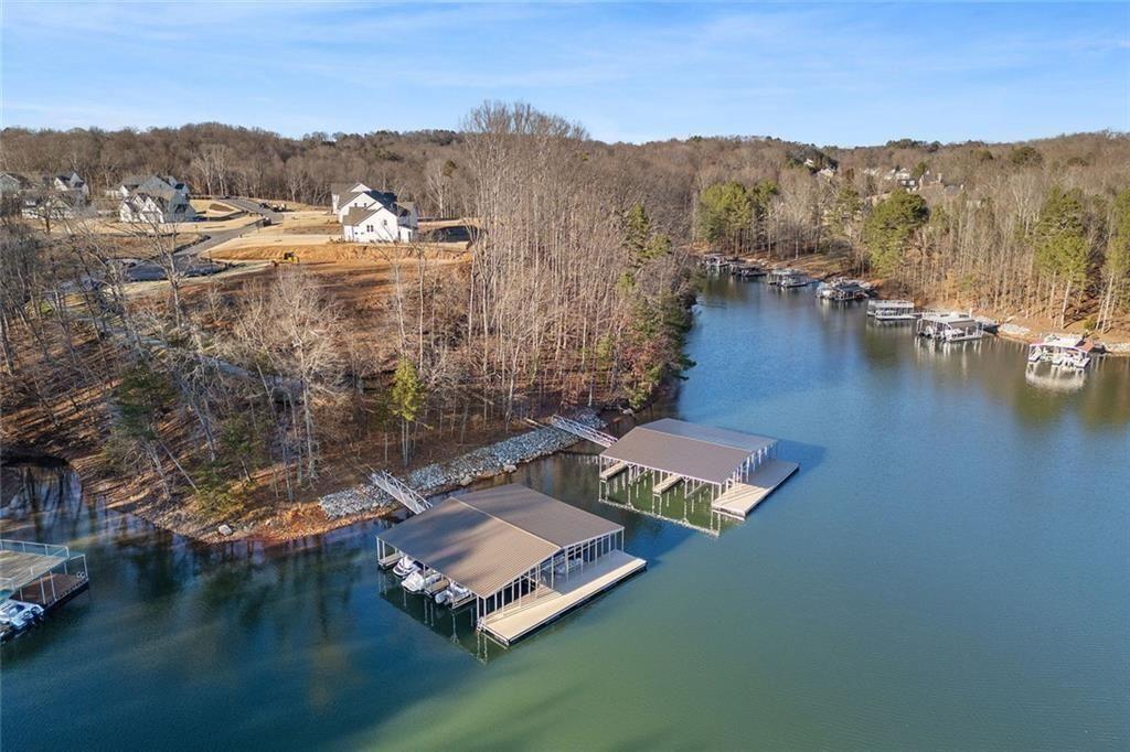 8345 Beryl Overlook Gainesville, GA 30506 - Photo 2 of 9 a view of a lake in middle of the town