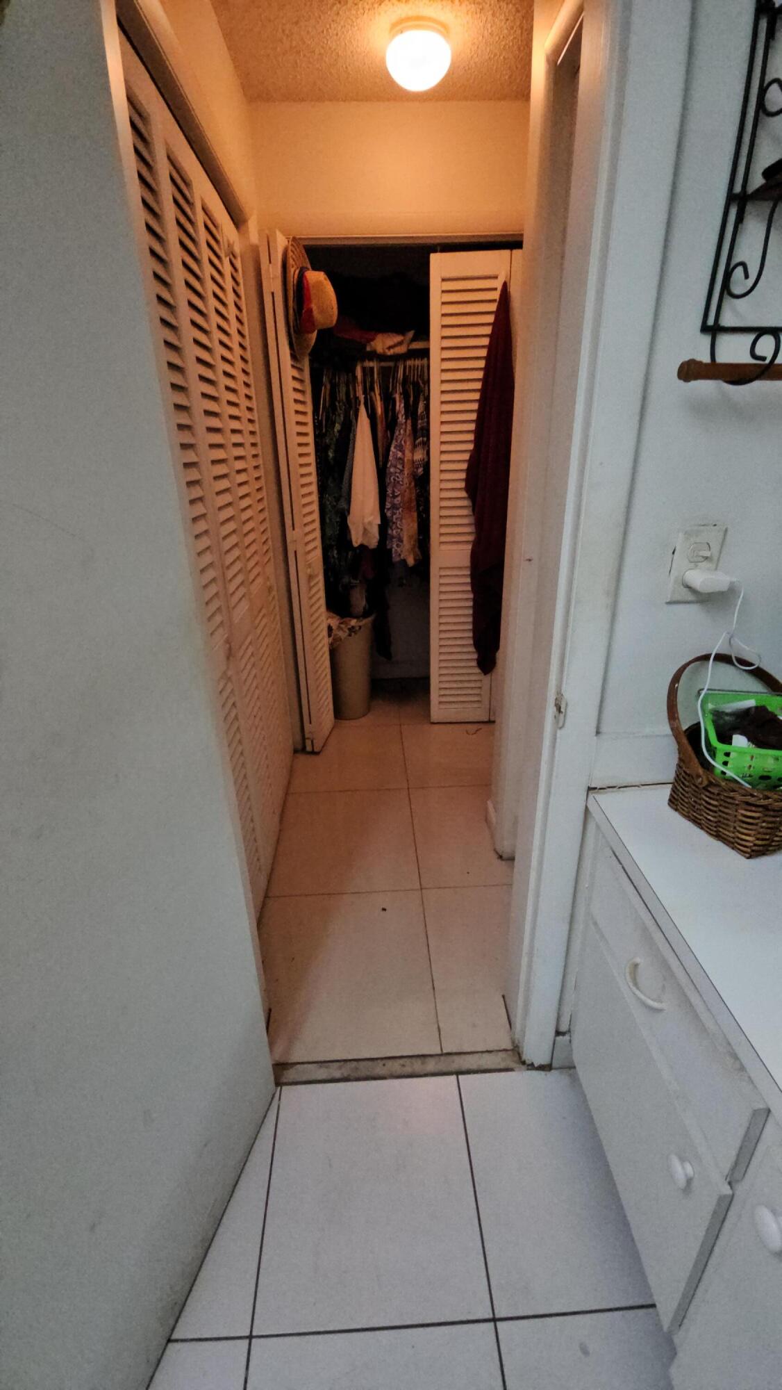 616 Northwest 13th Street, Unit 17 Boca Raton, FL 33486 - Photo 14 of 17 CLOSET IN MASTER BEDROOM