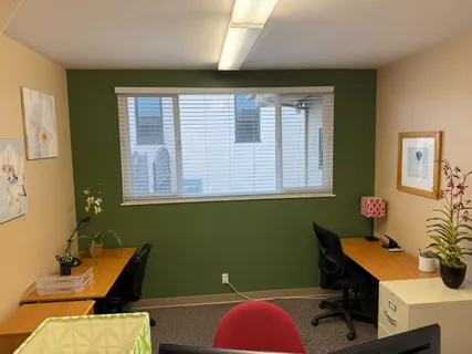 a room with furniture and a window