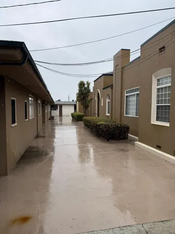 a view of a house with a street