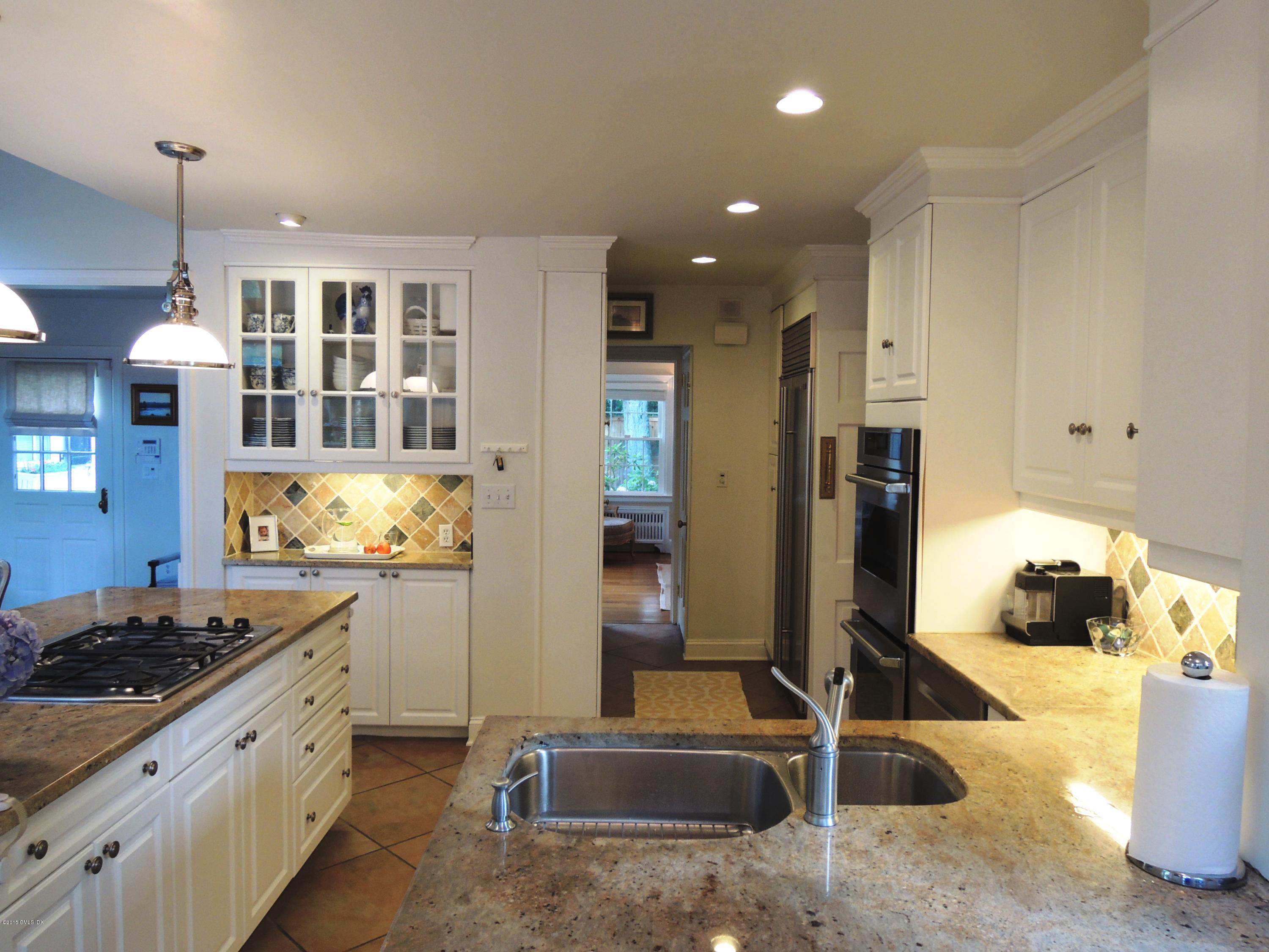 2 Cat Rock Road Cos Cob, CT 06807 - Photo 14 of 42 a kitchen with stainless steel appliances granite countertop a stove and a refrigerator