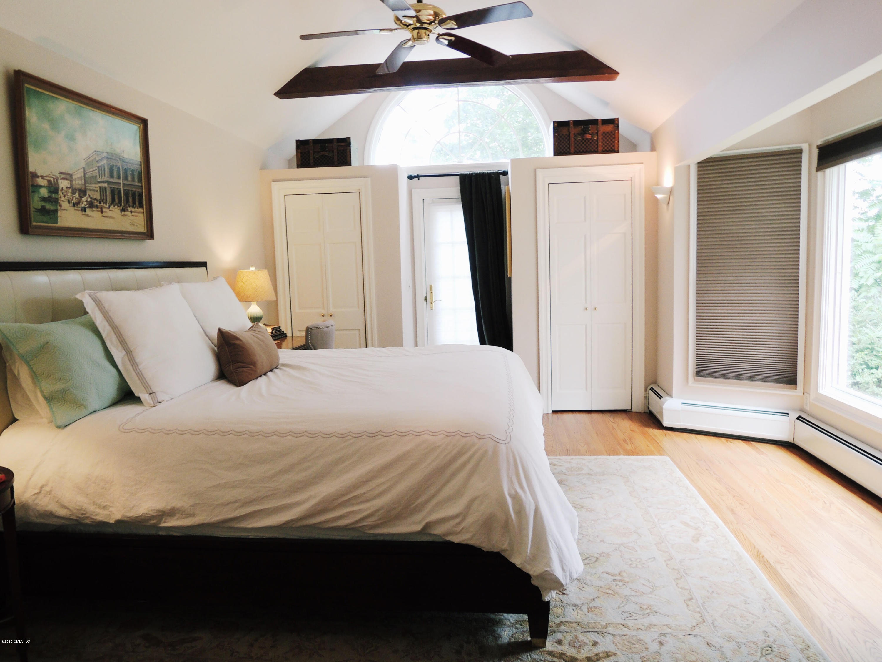 2 Cat Rock Road Cos Cob, CT 06807 - Photo 20 of 42 a bedroom with a bed and a window