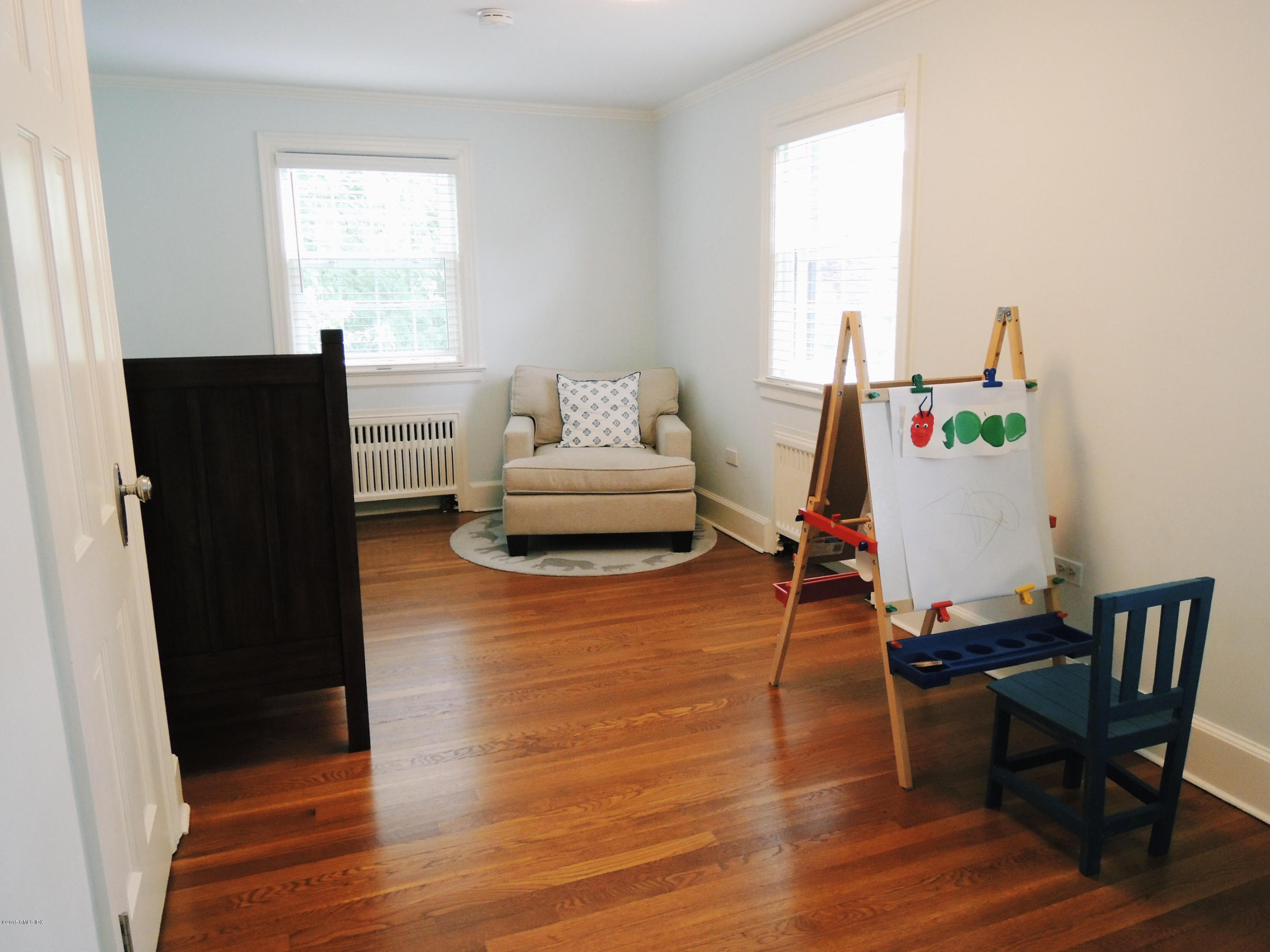 2 Cat Rock Road Cos Cob, CT 06807 - Photo 26 of 42 a living room with furniture and a wooden floor