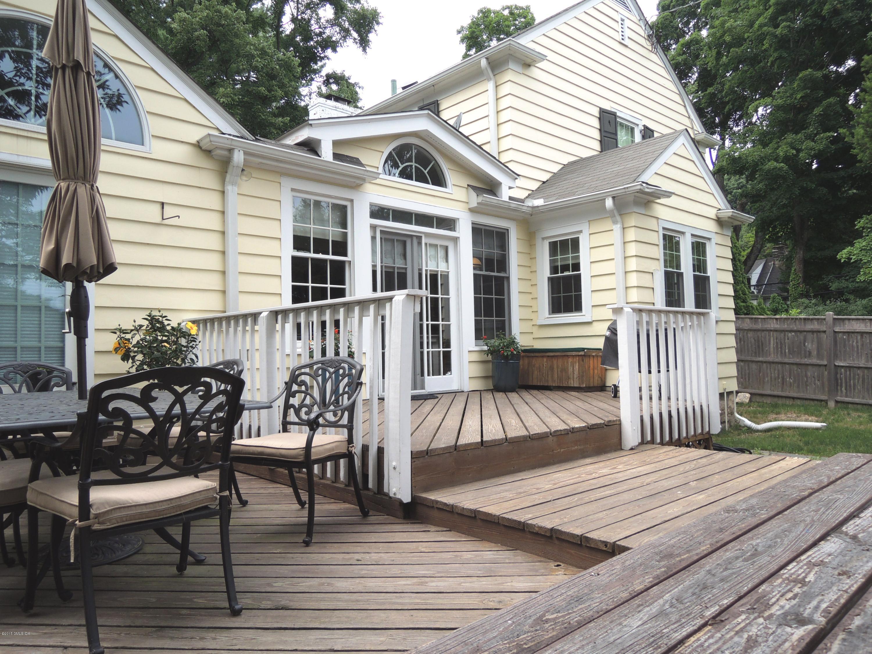 2 Cat Rock Road Cos Cob, CT 06807 - Photo 28 of 42 a roof deck with a table and chairs