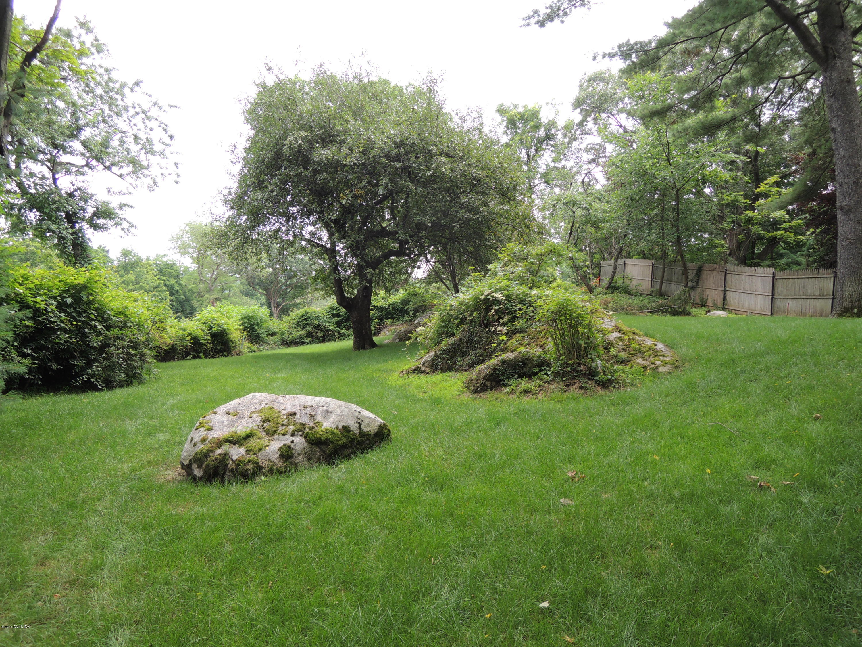 2 Cat Rock Road Cos Cob, CT 06807 - Photo 33 of 42 a view of a table and chairs in the garden