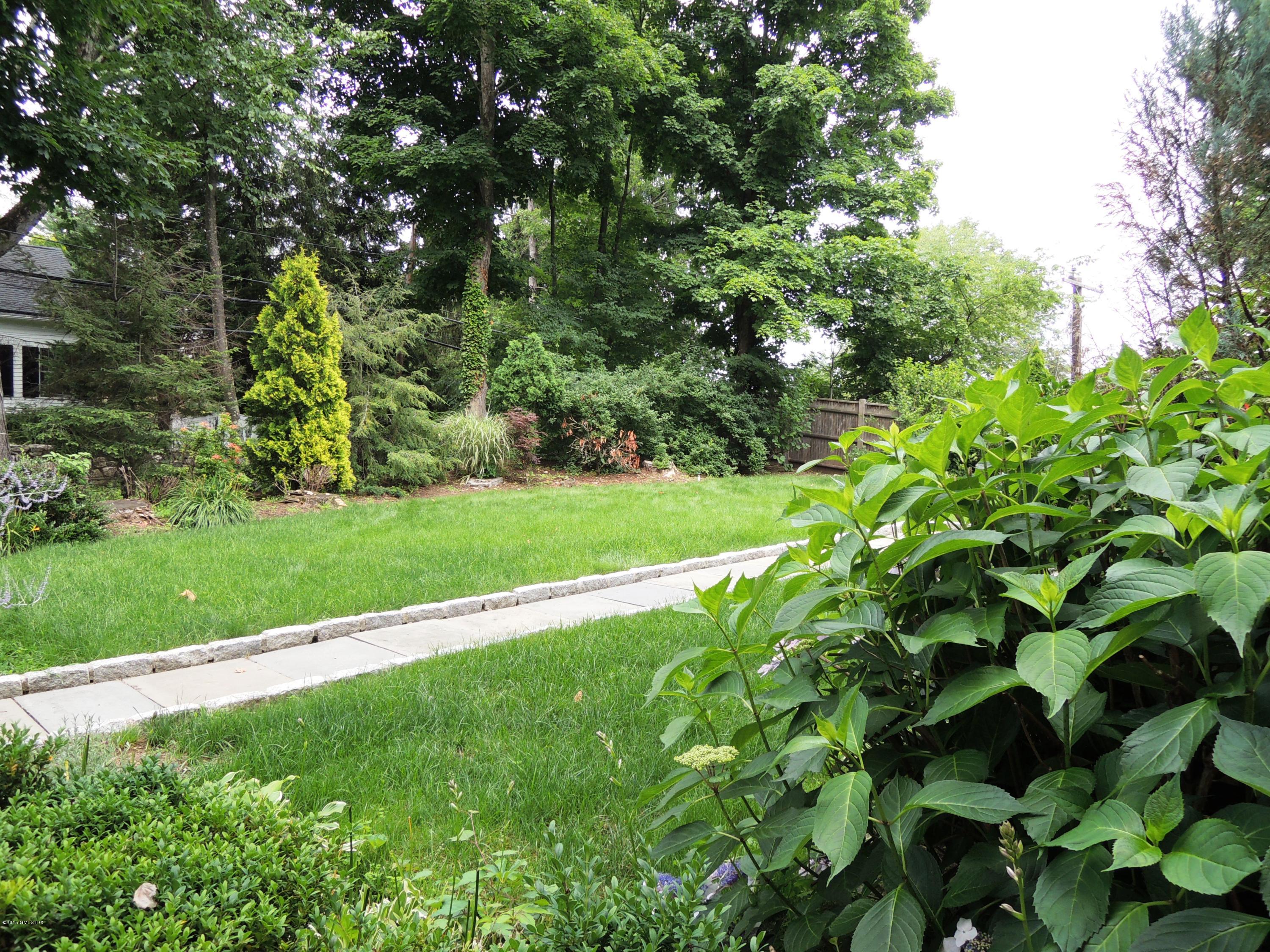 2 Cat Rock Road Cos Cob, CT 06807 - Photo 34 of 42 a view of a garden with a tree