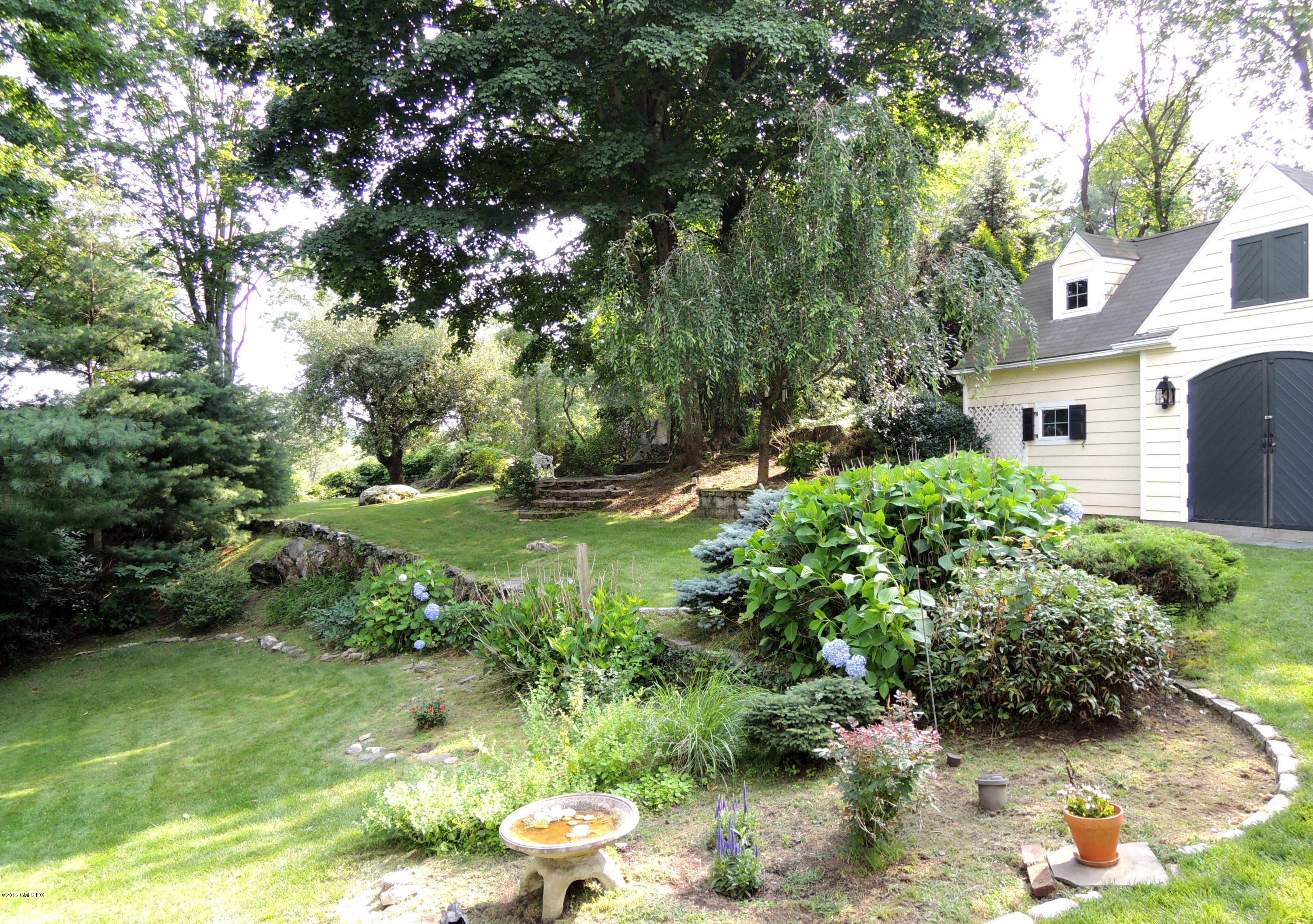 2 Cat Rock Road Cos Cob, CT 06807 - Photo 39 of 42 a view of a garden with a tree