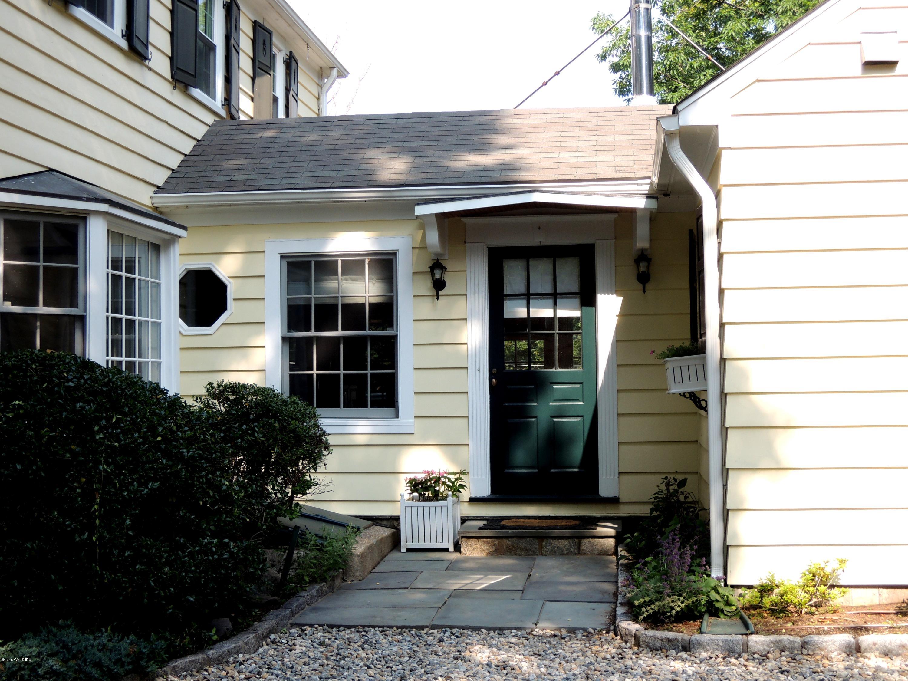 2 Cat Rock Road Cos Cob, CT 06807 - Photo 5 of 42 a front view of a house