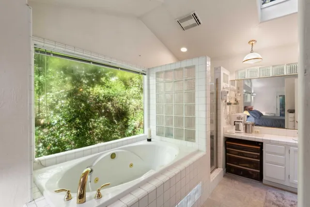 a view of workspace with wooden floor windows