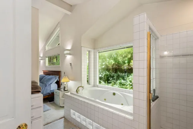 a view of a hallway with paintings on the wall