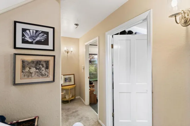 a living room with furniture window and a table