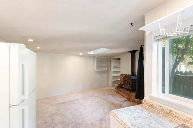 a view of a wooden deck with furniture